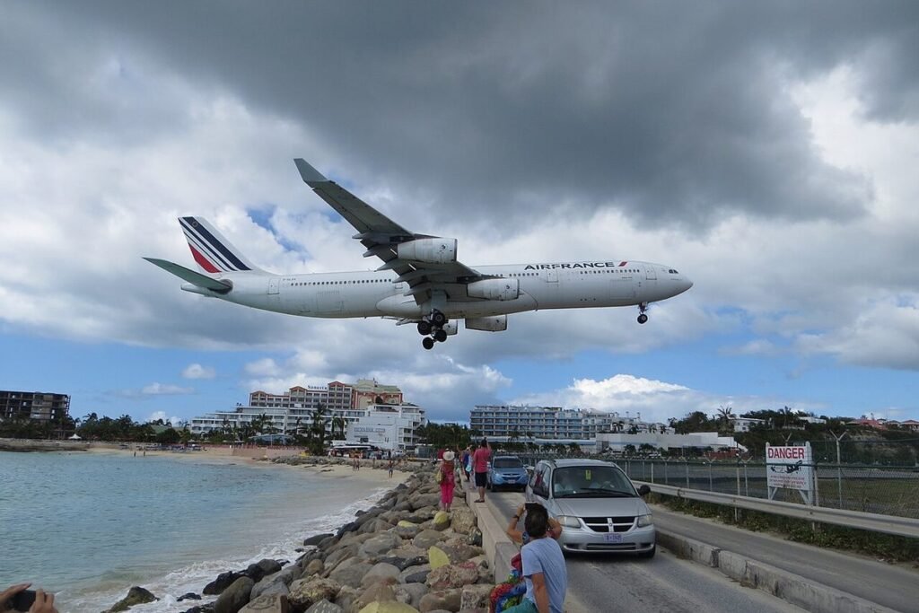 Air France Airbus A340 on short final passing low over the beach road at Princess Juliana Airport, Sint Maarten
